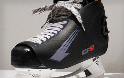 Hockey skate with CF9 ankle protection guard in place on boot