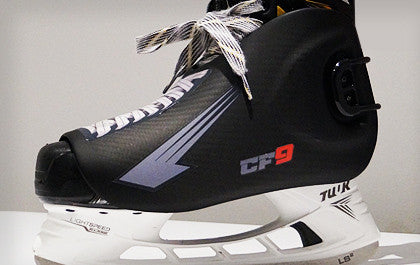 Hockey skate with CF9 ankle protection guard in place on boot